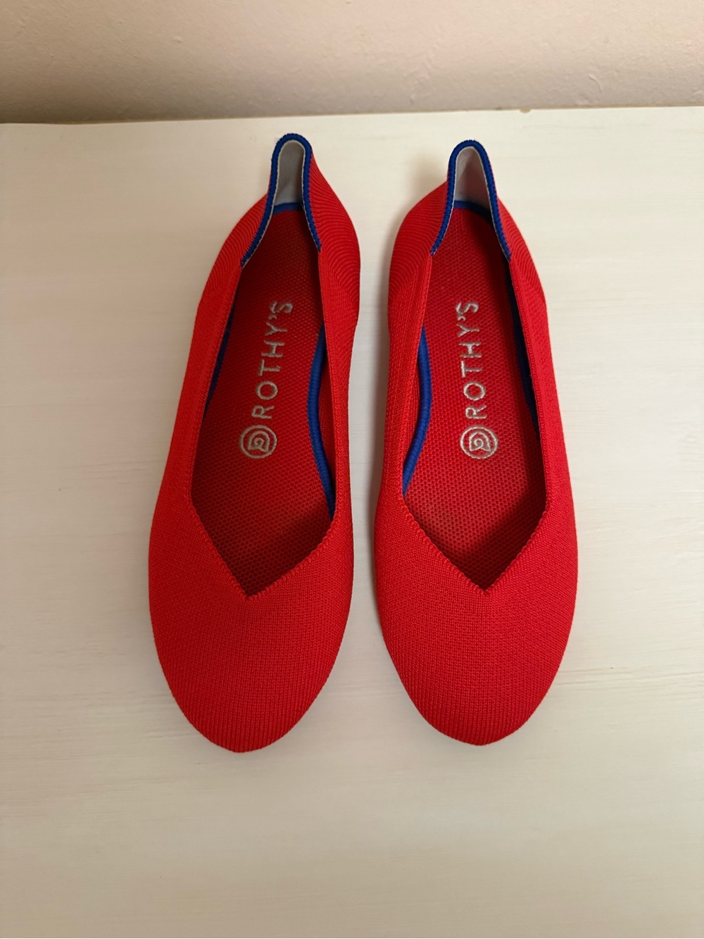 Rothy's Red Knit V‑Cut Slip-On Flats with Blue Trim
